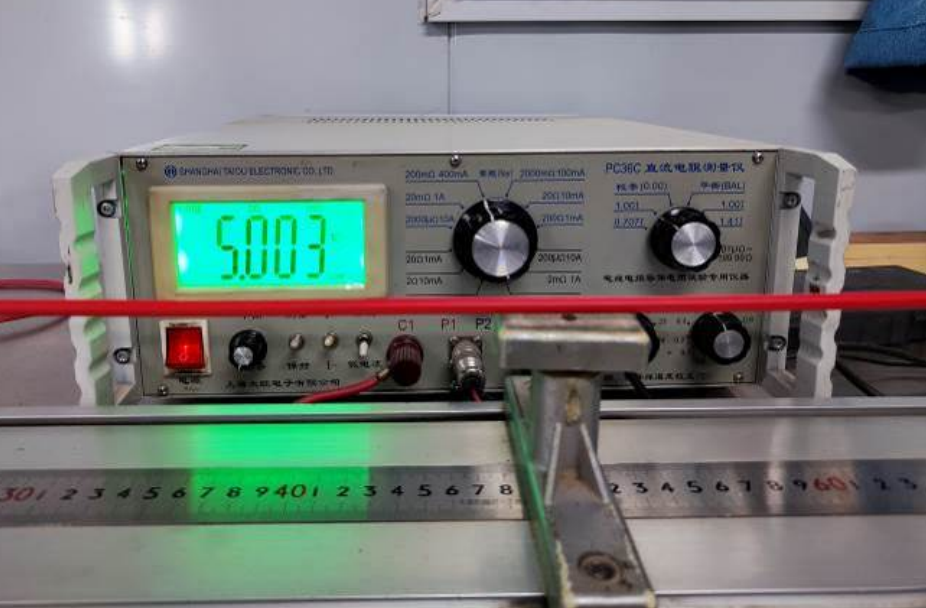 High-voltage withstand testing on power cable drums in factory testing facility